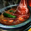 Bowl of Hearty Red Meat Stew.png