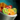 Bowl of Fruit Salad with Orange-Clove Syrup.png