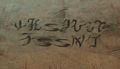 "Phoenix Roost" written in New Krytan at the base of the tower.